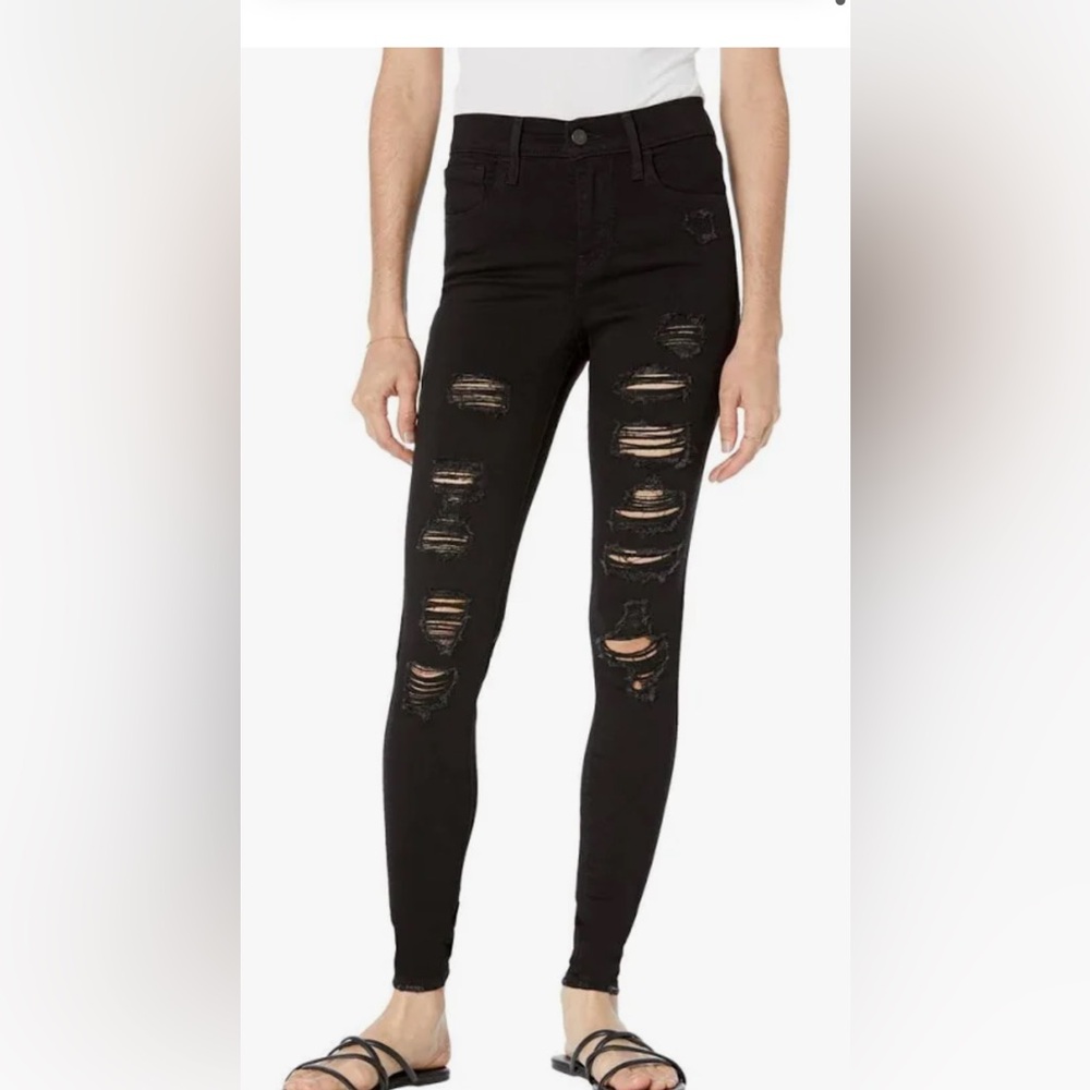 Never worn black Levi 720 jeans, super skinny, ripped. Size 27.
